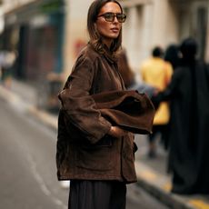 woman in brown outfit