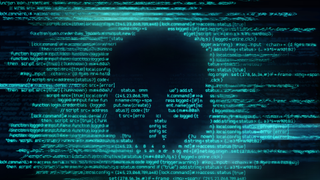 The outline of a skull displayed in computer code to represent malware