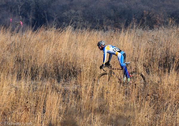 Skyler Trujillo (Fort Lewis) racing to second place in the tall grass.