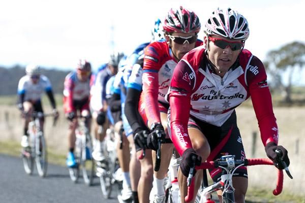 Darren Rolfe and Andrew Roe at the front of the peloton around six minutes behind the leading quartet approaching the town of Gretna.