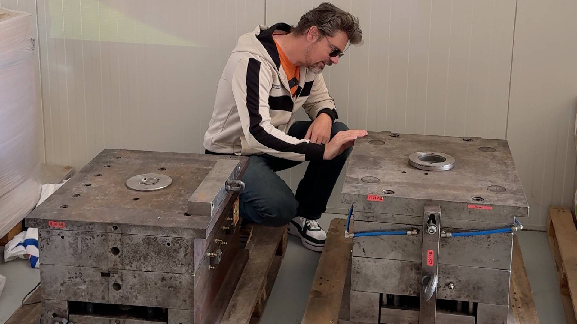 Peri Fractic crouching next to C64C Injection tooling blocks.