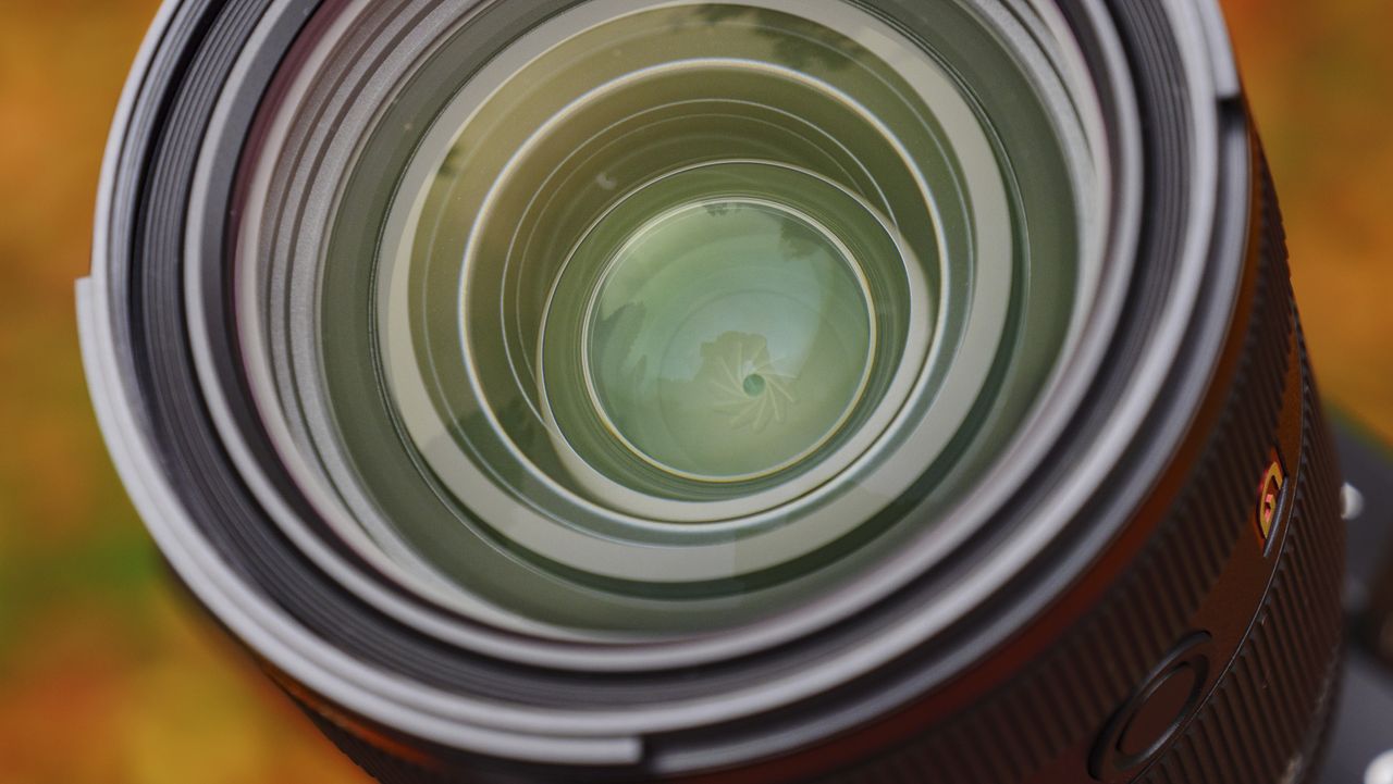 Closeup of the Sony FE 28-70mm F2 GM lens's front lens element