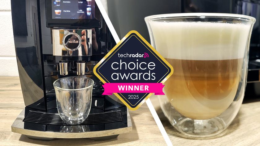 The Jura J10 coffee machine, with a glass coffee cup showing the quality of the coffee. There is a logo saying TechRadar Choice Awards Winner 2025