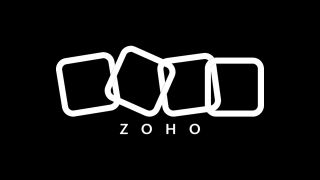 Zoho's four-box logo in a monochrome color scheme