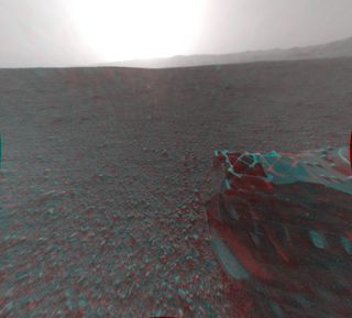 This image is a 3-D view behind NASA's Curiosity rover, which landed on Mars on Aug. 5 PDT (Aug. 6 EDT).