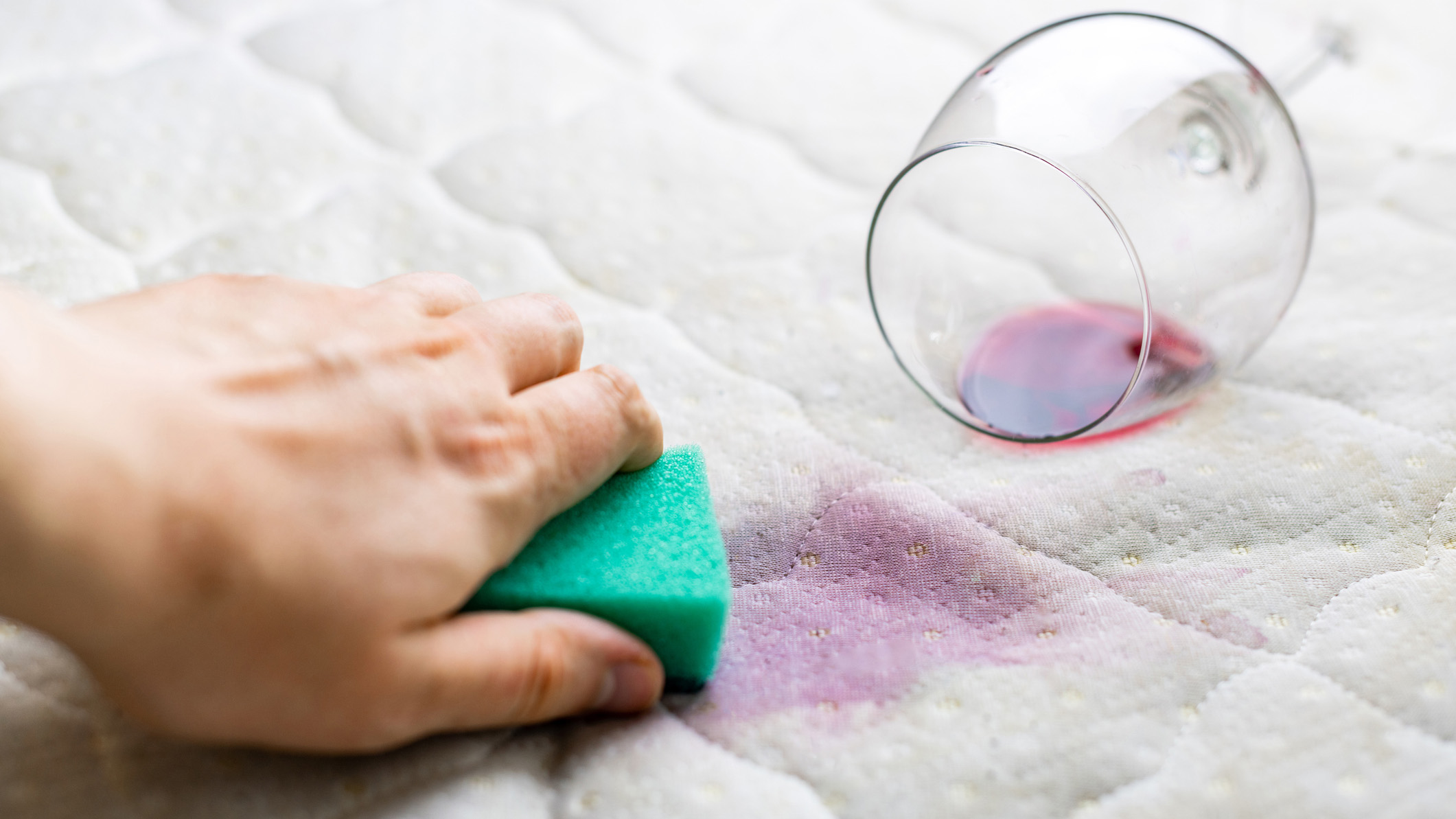Cleaning a mattress to get rid of freshly spilled red wine stains