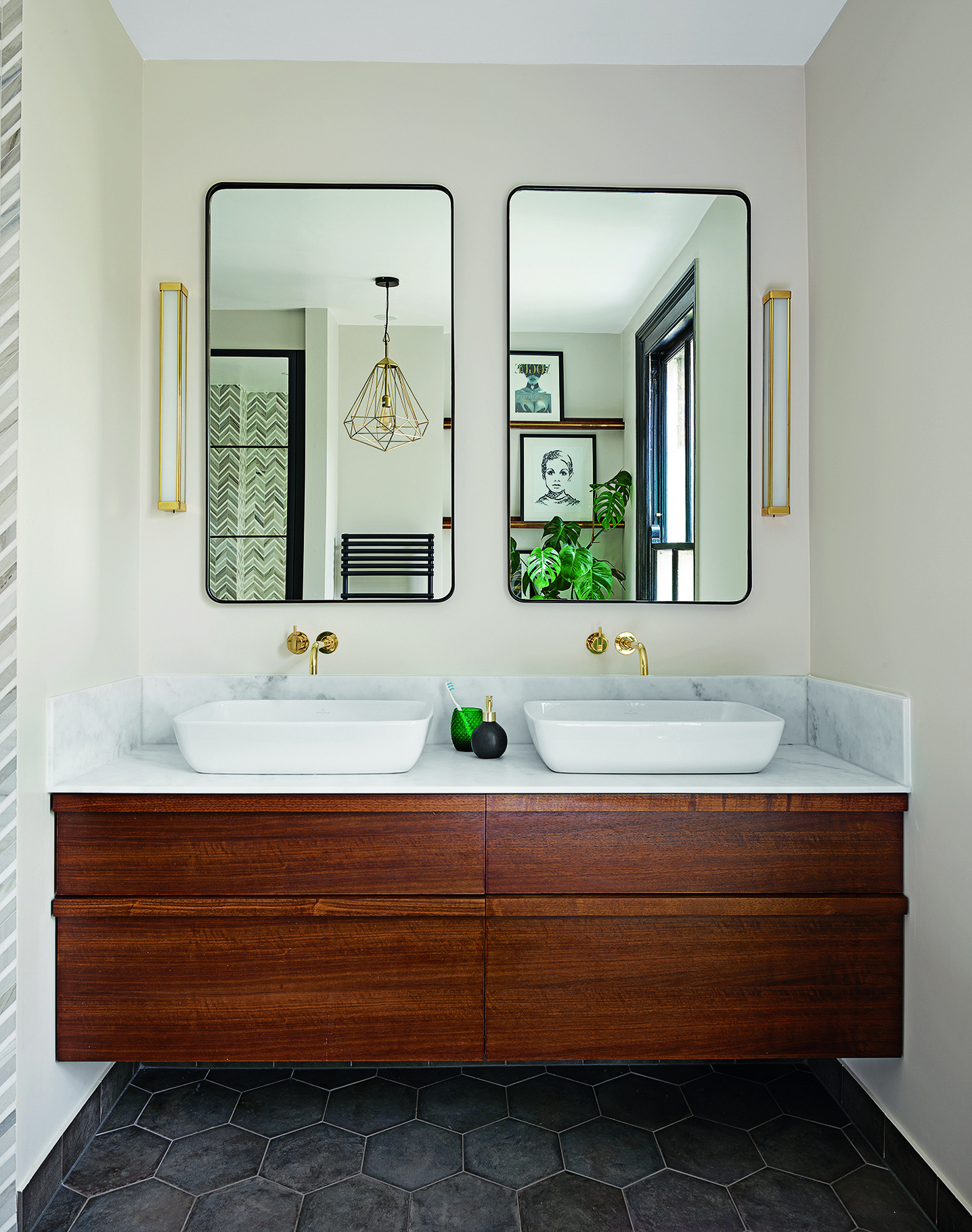 Two wash basins side by side on a bespoke washstand of walnut wood