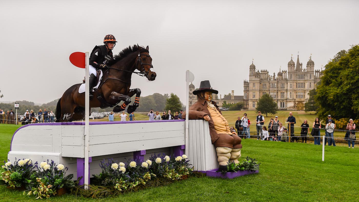 Tom Bird and Cowling Hot Gossip jump Lambert&rsquo;s Sofa at Burghley 2024 with Burghley House in the background.