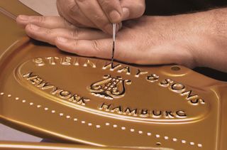 Steinway & Sons logo painting