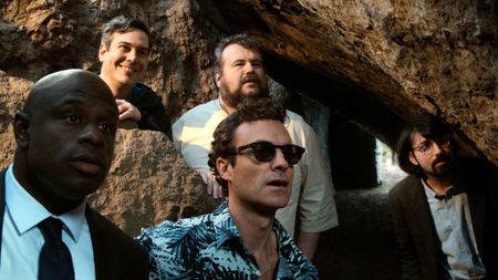 Miles Jr., Jack Jr. Mitch, Kevin, and Stifler's Brother standing at cave entrance in The Napa Boys