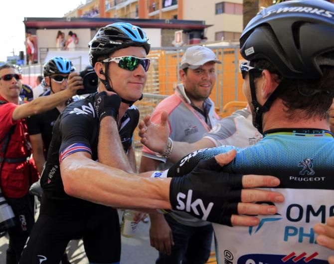 Bradley Wiggins (Sky) congratulates former teammate and stage six winner Mark Cavendish (Omega Pharma-QuickStep)