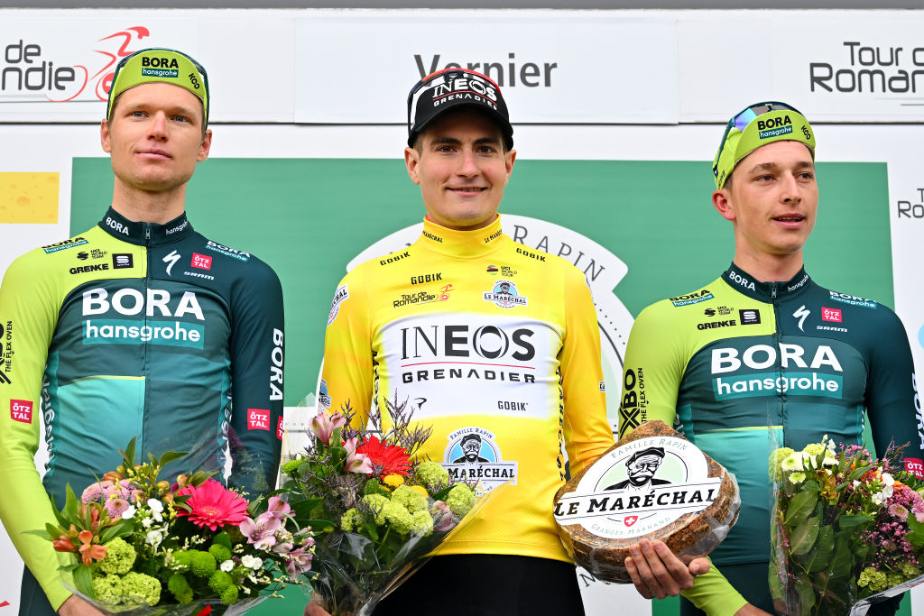 VERNIER SWITZERLAND APRIL 28 LR Aleksandr Vlasov of Russia and Team BORA hansgrohe on second place race winner Carlos Rodriguez Cano of Spain and Team INEOS Grenadiers Yellow leader jersey and Florian Lipowitz of Germany and Team BORA hansgrohe on third place pose on the podium ceremony after the 77th Tour De Romandie 2024 Stage 5 a 1508km stage from Vernier to Vernier UCIWT on April 28 2024 in Vernier Switzerland Photo by Luc ClaessenGetty Images