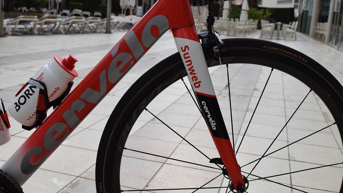 A red to white fade on the down tube is overlaid with silver Cervelo decals
