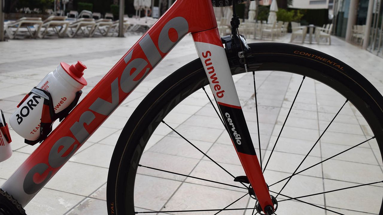 A red to white fade on the down tube is overlaid with silver Cervelo decals
