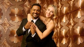 Hosts Alfonso Ribeiro and Juliane Hough posing for Dancing with the Stars Season 34