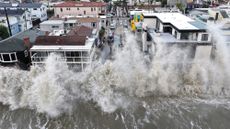 Waves hit homes in Long Beach, Calif.