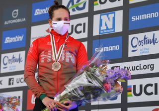 OOSTENDE BELGIUM JANUARY 31 Podium Blanka Vas Kata of Hungary Bronze medal Celebration Mask Covid Safety Measures Flowers during the 72nd UCI CycloCross World Championships Oostende 2021 Women U23 UCICX CXWorldCup Ostend2021 CX on January 31 2021 in Oostende Belgium Photo by Luc ClaessenGetty Images