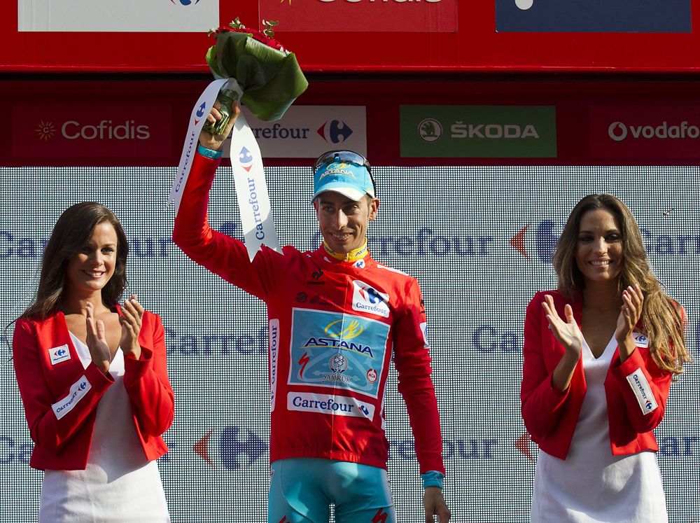 Fabio Aru (Astana) in red on the stage 12 podium.