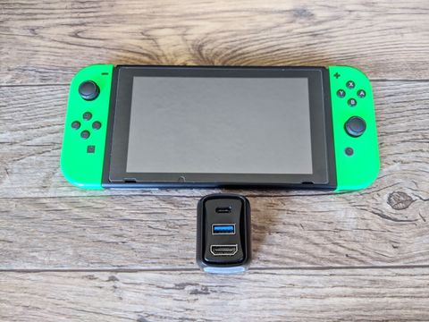 Genki Covert Dock On Table Next To Switch
