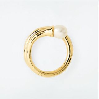 flat lay image of pearl ring