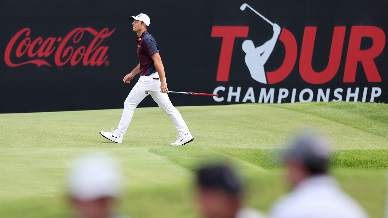 Viktor Hovland walks off the green at the Tour Championship