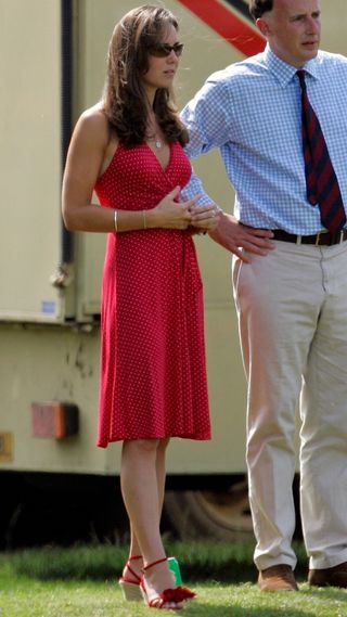 Kate Middleton and Prince William's Private Secretary Jamie Lowther-Pinkerton watch Prince William compete in the Chakravarty Cup charity polo match in 2006