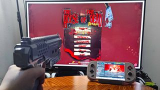 The House of the Dead remake on a Samsung TV with a Sinden Lightgun being used on left hand side