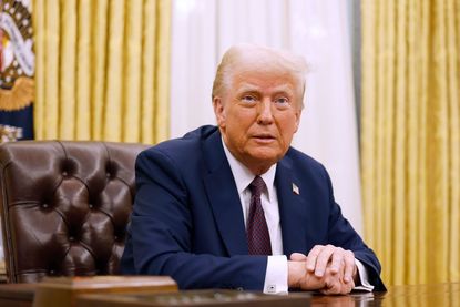 WASHINGTON, DC - JANUARY 23 U.S. President Donald Trump speaks to reporters after signing a series of executive orders in the Oval Office of the White House on January 23, 2025 in Washington, DC. Trump signed a range of