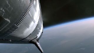 an onboard camera view of a spacecraft above Earth