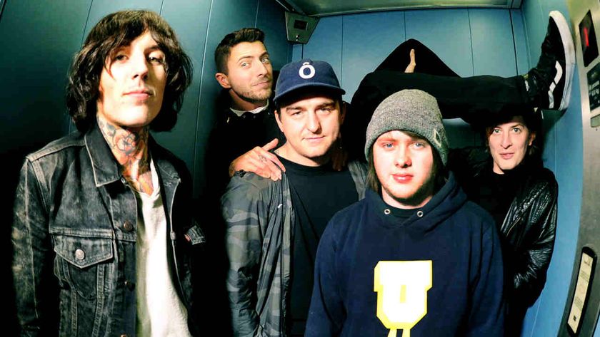 Bring Me The Horizon posing for a photograph in 2015