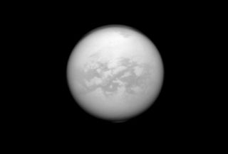 An instrument aboard NASA's Cassini spacecraft peers through Titan's haze to see this equatorial region dubbed Senkyo.