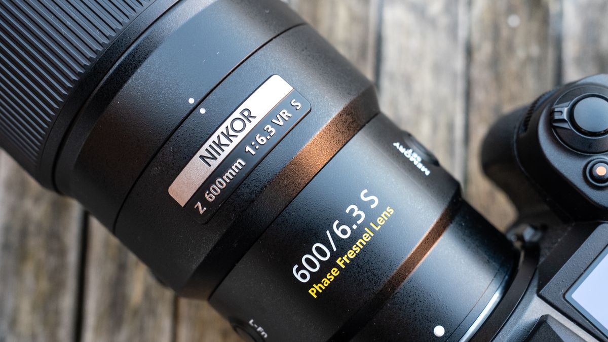 Nikkor Z 600mm f/6.3 VR S attached to a Nikon Z 7II on a frosty wooden table