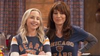 Becky and Louise in Chicago Bears shirts working in The Lunch Box on The Conners