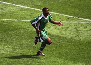Nigeria's Sunday Oliseh celebrates his winner against Spain at the 1998 World Cup.