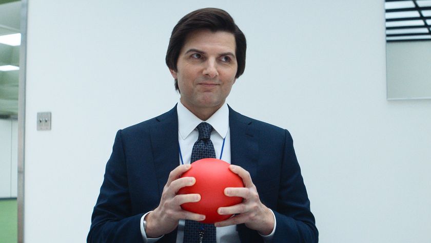 Innie Mark holding red ball inside Lumen building in Severance Season 2