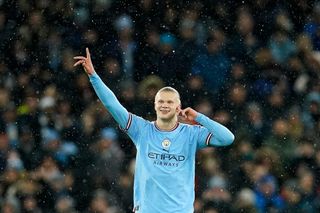 Erling Haaland of Manchester City celebrates after scoring his first of five goals against RB Leipzig during the Champions League last 16 second leg match at the Etihad Stadium, March 2023