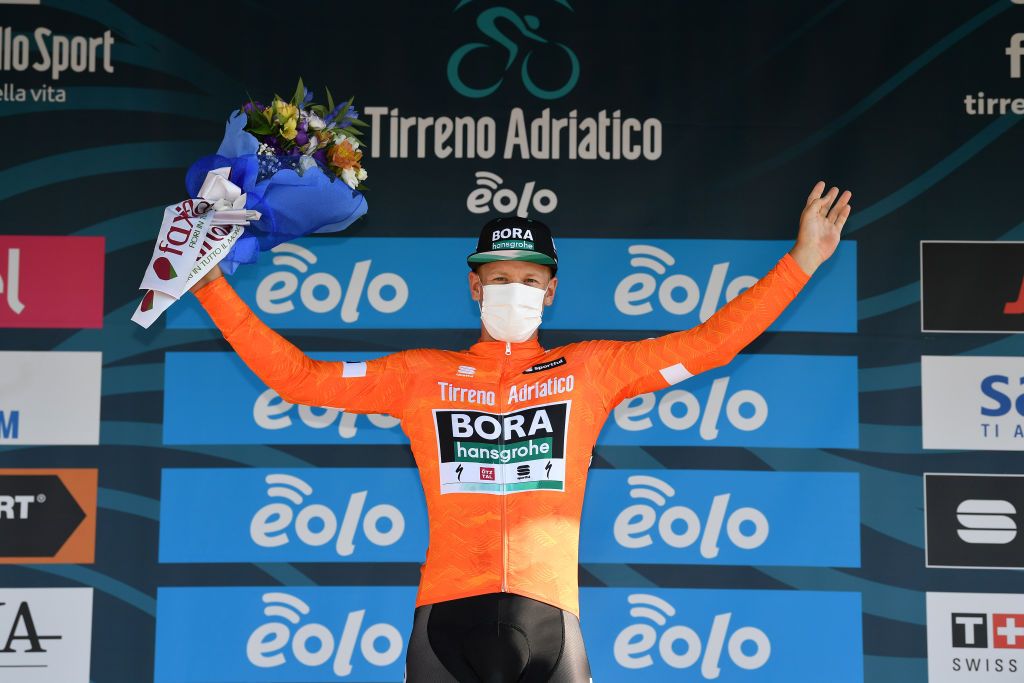 LORETO ITALY SEPTEMBER 13 Podium Pascal Ackermann of Germany and Team BoraHansgrohe Orange Points Jersey Celebration Flowers during the 55th TirrenoAdriatico 2020 Stage 7 a 181km stage from Pieve Torina to Loreto 114m TirrenAdriatico on September 13 2020 in Loreto Italy Photo by Justin SetterfieldGetty Images