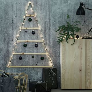 Retro decorated christmas tree on the wall