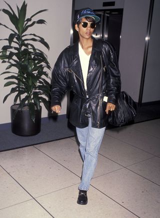 Halle Berry in leather jacket and jeans