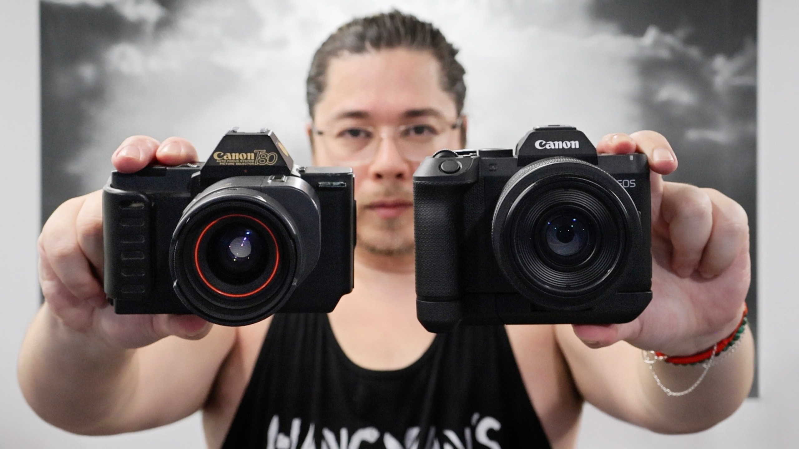 James Artaius holding a Canon EOS R8 Mark II and a Canon T80