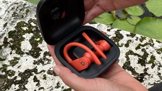 best sport headphones: The Beats Powerbeats Pro in Lava Red
