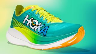 Hoka Rocket X 2 shoe on abstract green and yellow background