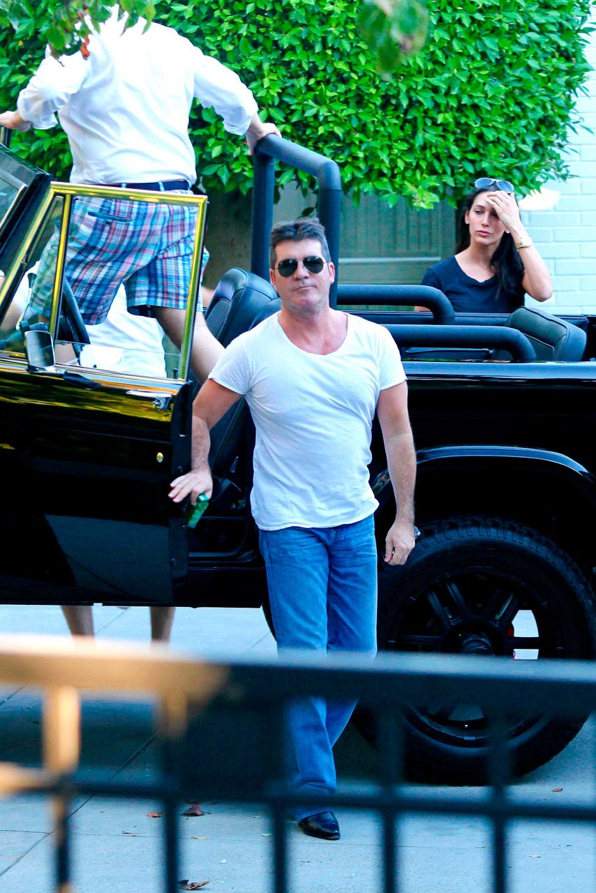 Simon Cowell and Lauren Silverman drive around LA in 2012