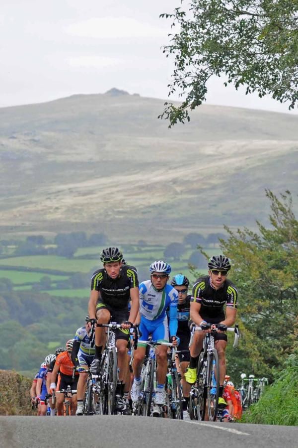 The bunch climbs on Dartmoor