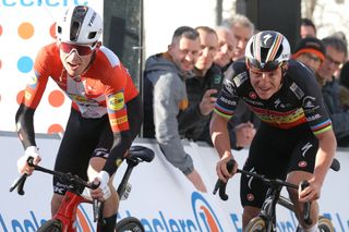 Lidl-Trek's Danish cyclist Mattias Skjelmose (L) and Soudal Quickâ€“Step's Belgian cyclist Remco Evenepoel cross the finish line of the 4th stage of the Paris-Nice cycling race, 183 km between Chalon-sur-Saone and Mont Brouilly, on March 6, 2024. (Photo by Thomas SAMSON / AFP)