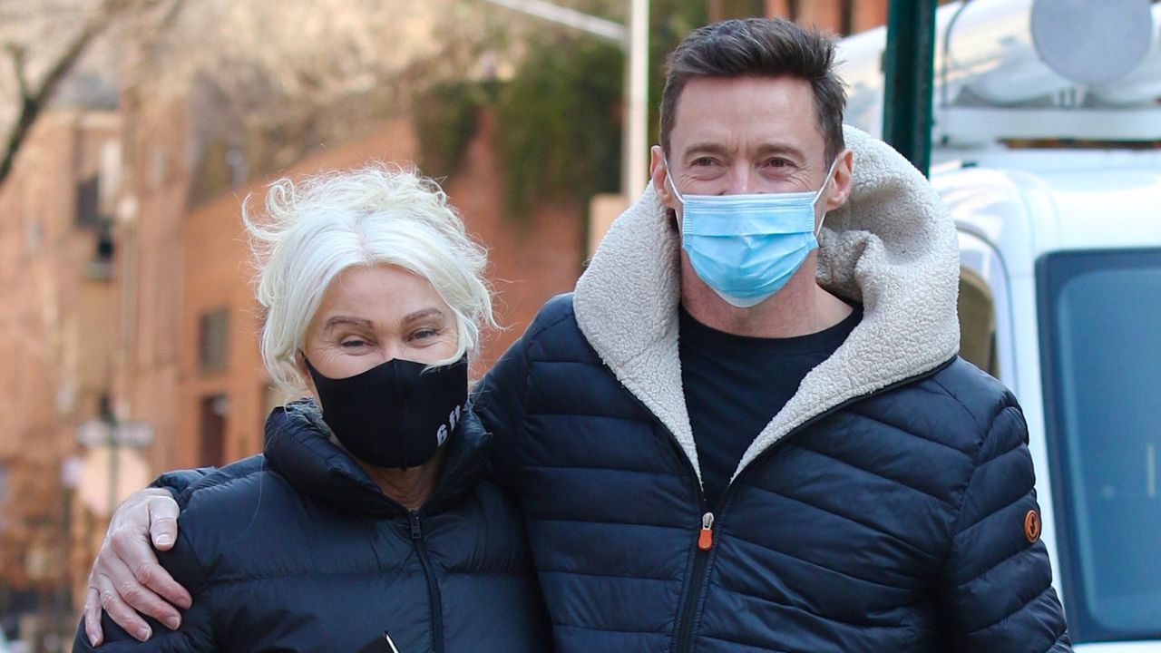 Hugh Jackman and Deborra-Lee Furness take their dog Dali for a walk on March 10, 2021 in New York City.