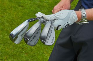 Ged Walters showing three Benross wedges in his hands