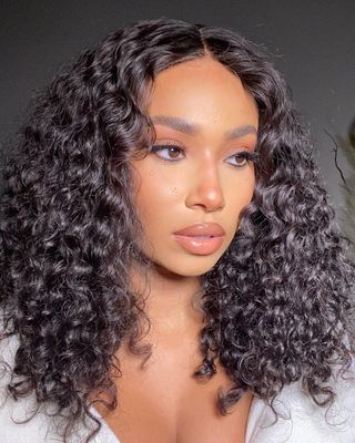 Symphani Soto with juicy curls and natural glam makeup