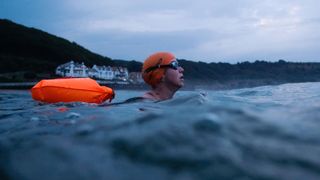Ruth Stansfield a member of the Whitby Wild Swimming group swims in the North Sea during an evening swim on September 22, 2019 in Whitby, England. Whitby Wild Swimming group was set up in May and meet twice a week. The group has members with a range of abilities from people who have never swam in the sea before to a former channel swimmer. Most of the group are working towards ‘skin swimming’ where only swimming costumes are worn rather than wetsuits. The group swim each time they meet unless sea conditions prove to be too hazardous. Sea swimming is said to benefit health by increasing the metabolism, boosting the immune system, improving circulation and the cold water stimulates the parasympathetic nervous system which is responsible for repairing the body. (Photo by Ian Forsyth/Getty Images)