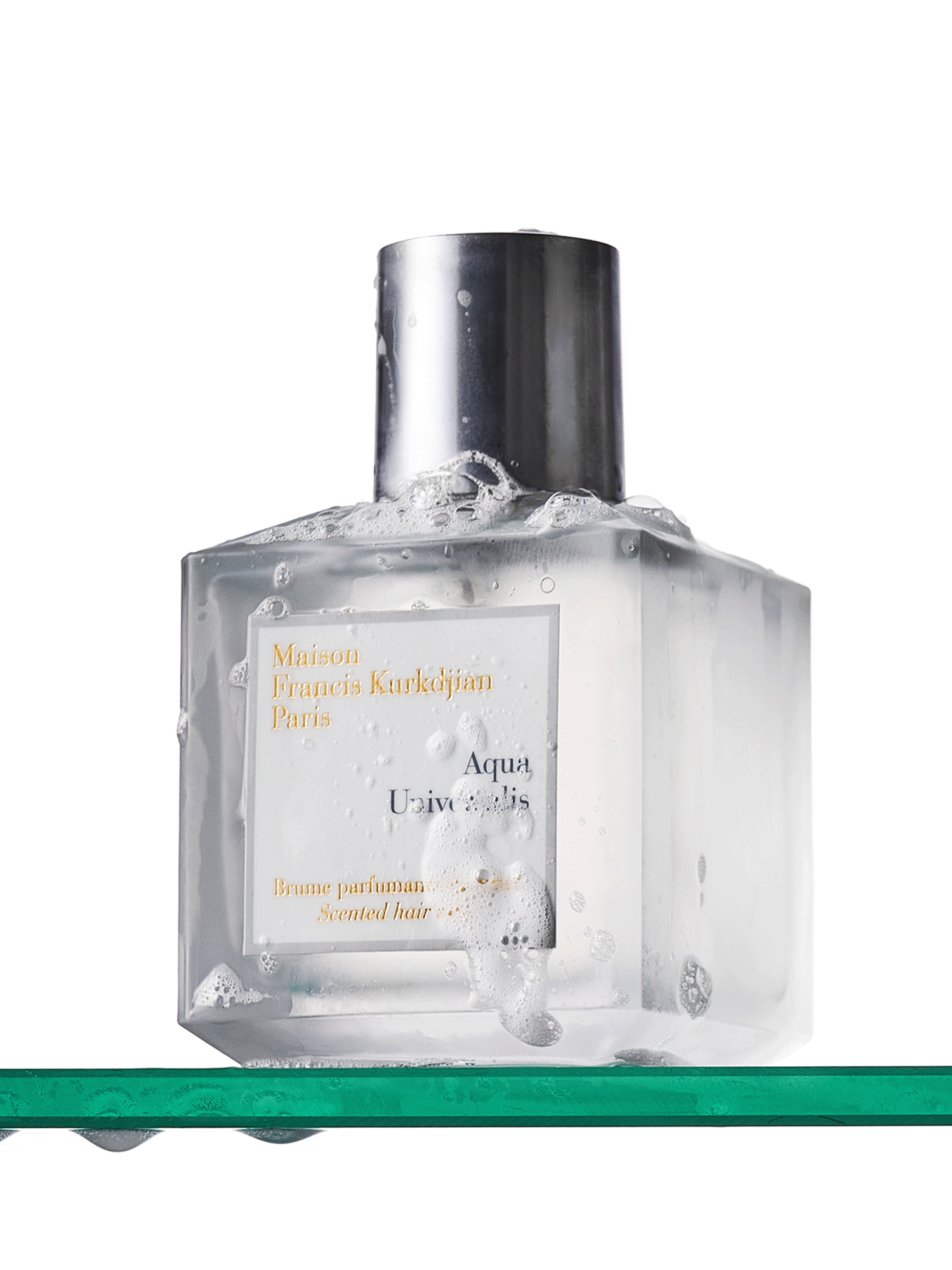 A gif of the Maison Francis Kurkdjian scented hair mist with and without shower suds